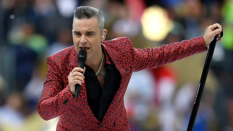 Robbie Williams retorna ao Brasil e quer mostrar que é o
