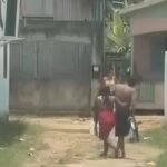 Vídeo mostra homem embriagado tentando chegar até bicicleta com ajuda da companheira no Acre